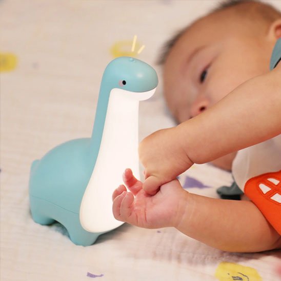 Veilleuse bébé bebe dort dinosaure bleu