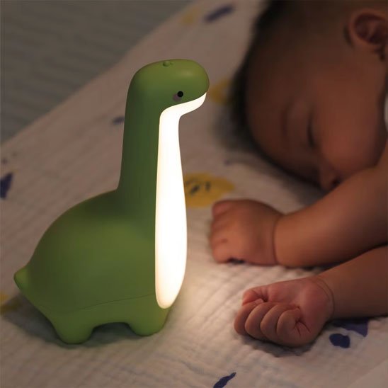 Veilleuse bébé bebe dort dinosaure vert